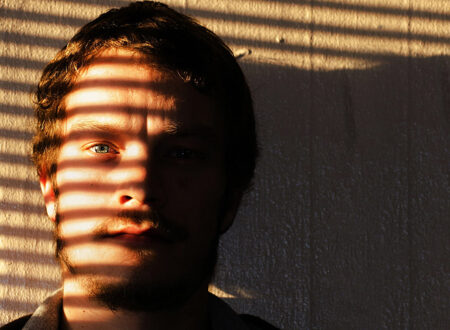 Person standing at a crossroads symbolizing the difference between discipline and obsession