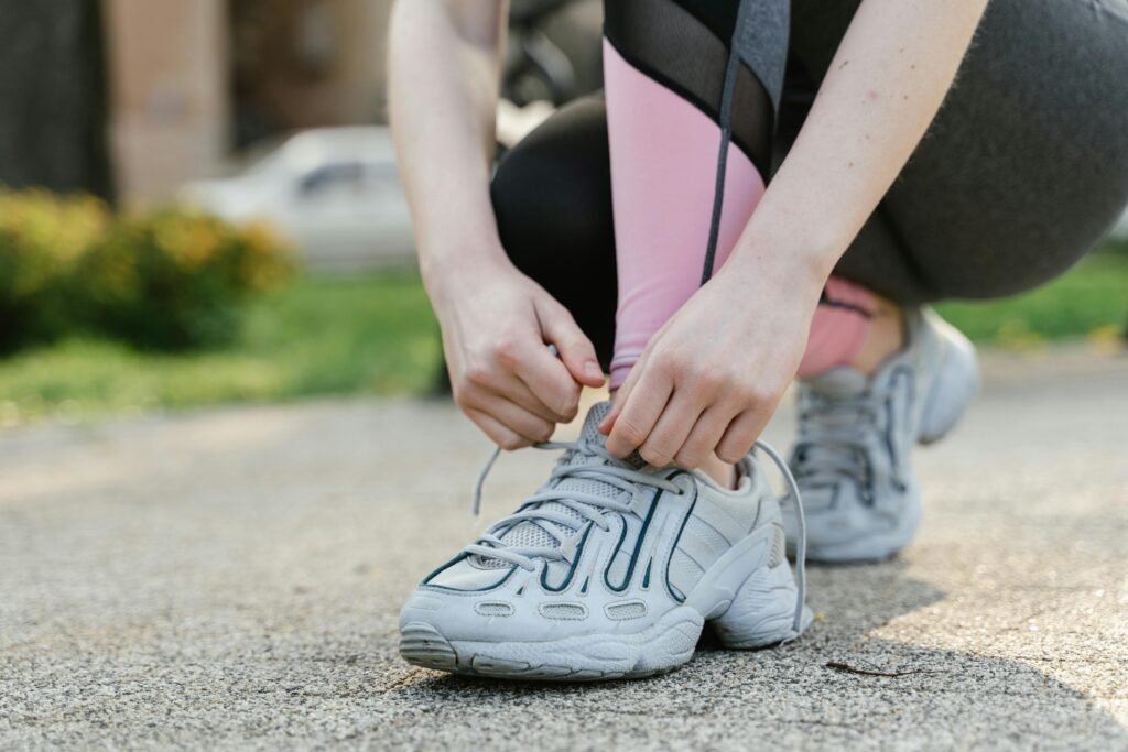 Gym bag placed on the floor next to training shoes before a workout