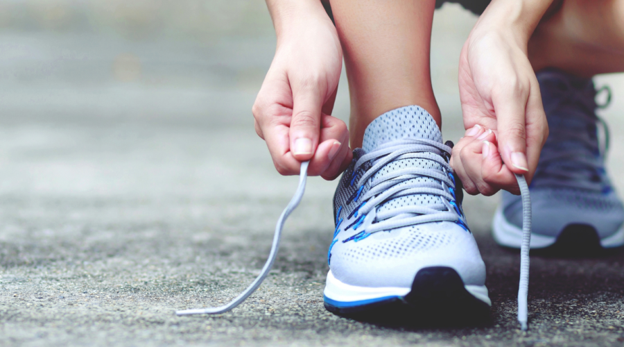 Person improving metabolism through exercise sleep and daily movement