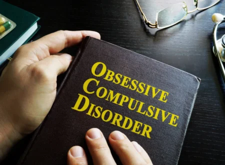 Person overwhelmed by intrusive thoughts representing obsessive-compulsive disorder cycle