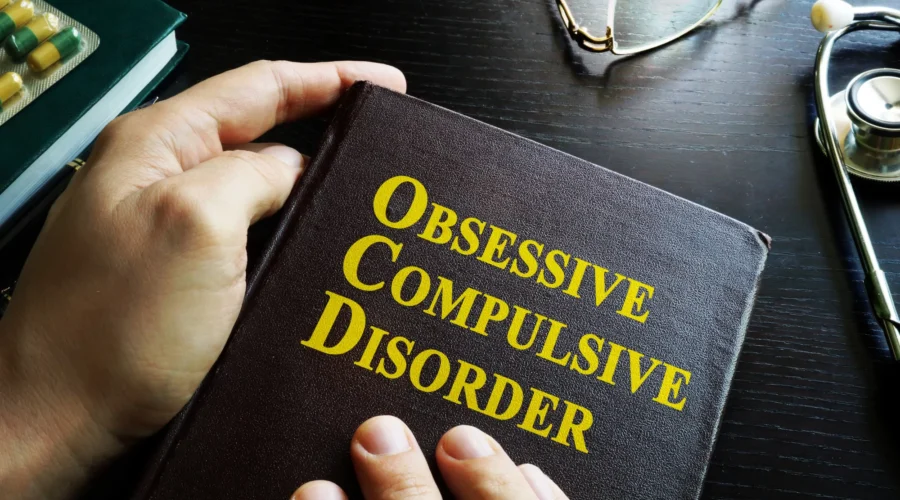 Person overwhelmed by intrusive thoughts representing obsessive-compulsive disorder cycle