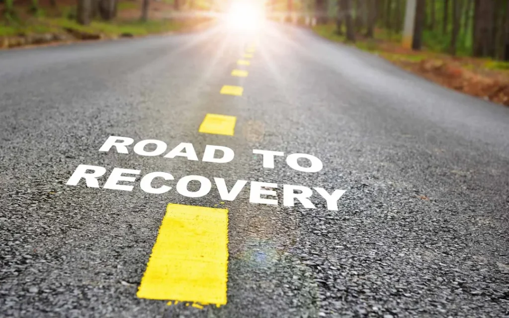 Person reflecting on burnout and recovery journey over time