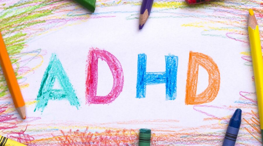 Person overwhelmed with multiple tasks and thoughts representing ADHD and difficulty focusing