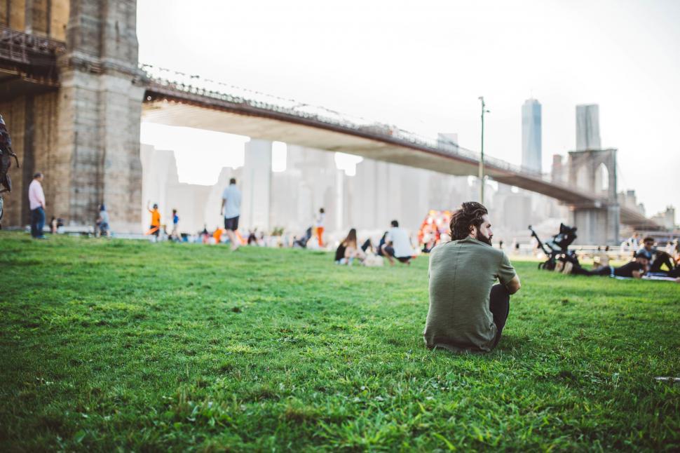 Person experiencing social anxiety feeling isolated in a group setting